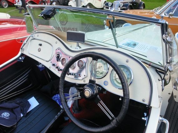 The interior and dashboard of a 1952 MG TD.